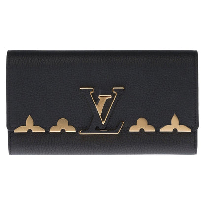 LOUIS VUITTON Brand New Capucines GM Wallet in black Taurillon leather