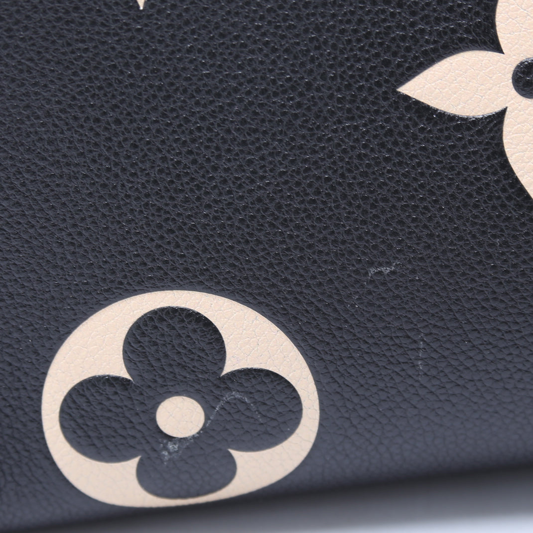 ONTHEGO MM Bicolor Empreinte Black/Beige