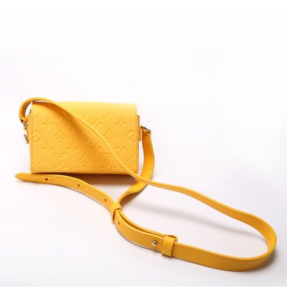 Louis-Vuitton Steamer Wearable Wallet Taurillon Yellow