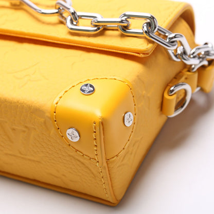 Louis-Vuitton Steamer Wearable Wallet Taurillon Yellow