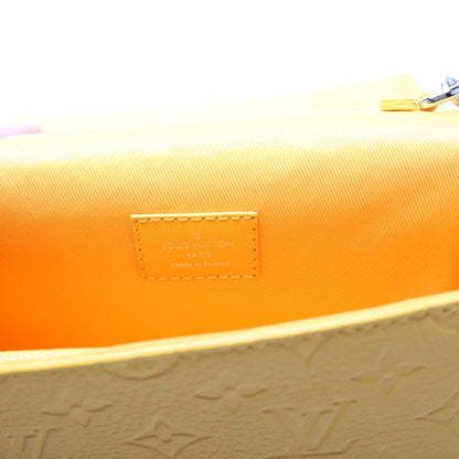 Louis-Vuitton Steamer Wearable Wallet Taurillon Yellow