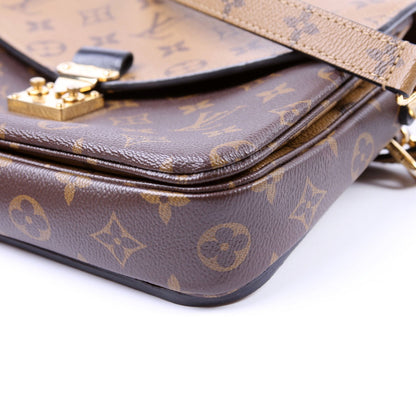 Pochette Metis Reverse Monogram