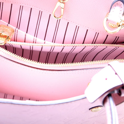 Louis-Vuitton Montaigne MM Empreinte Pink
