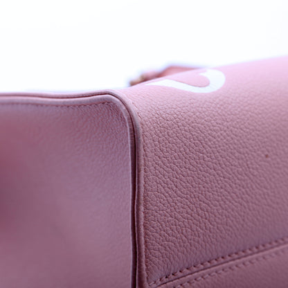 Louis-Vuitton ONTHEGO MM Bicolor Empreinte Giant Monogram Pink