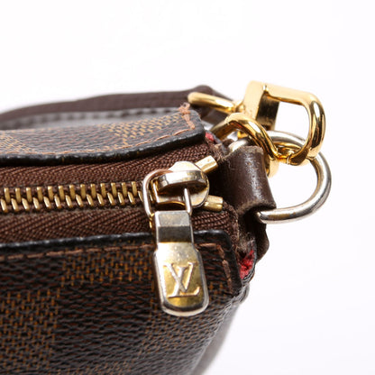 Louis-Vuitton Eva Clutch Damier Ebene
