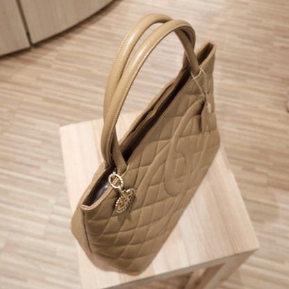 Chanel vintage medallion beige tote bag