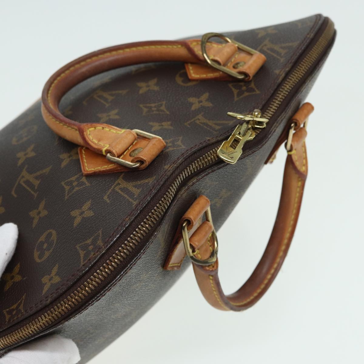 LOUIS VUITTON Alma Handbag