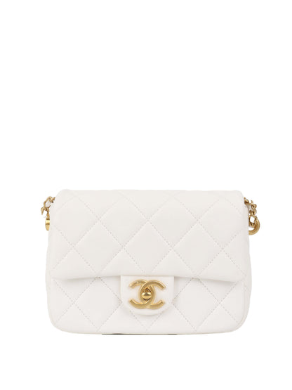 Chanel White and Pearl Chain Flap Bag.
