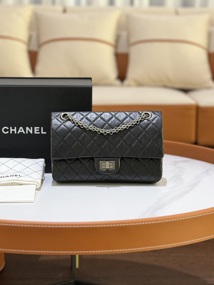CHANEL 2.55 BLACK WITH SILVER HARDWARE AND CHIP
