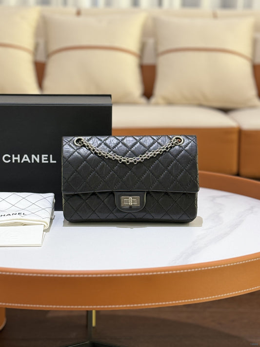 CHANEL 2.55 BLACK WITH SILVER HARDWARE AND CHIP