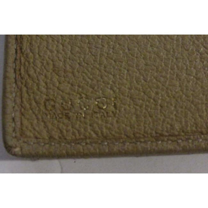 Vintage, Gucci, brown suede and leather, XL wallet with interior compartments, a bamboo and gold horse bit accent on the front