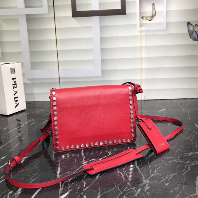 Prada Etiquette Bag In Red Calfskin With Metal Stud Trim