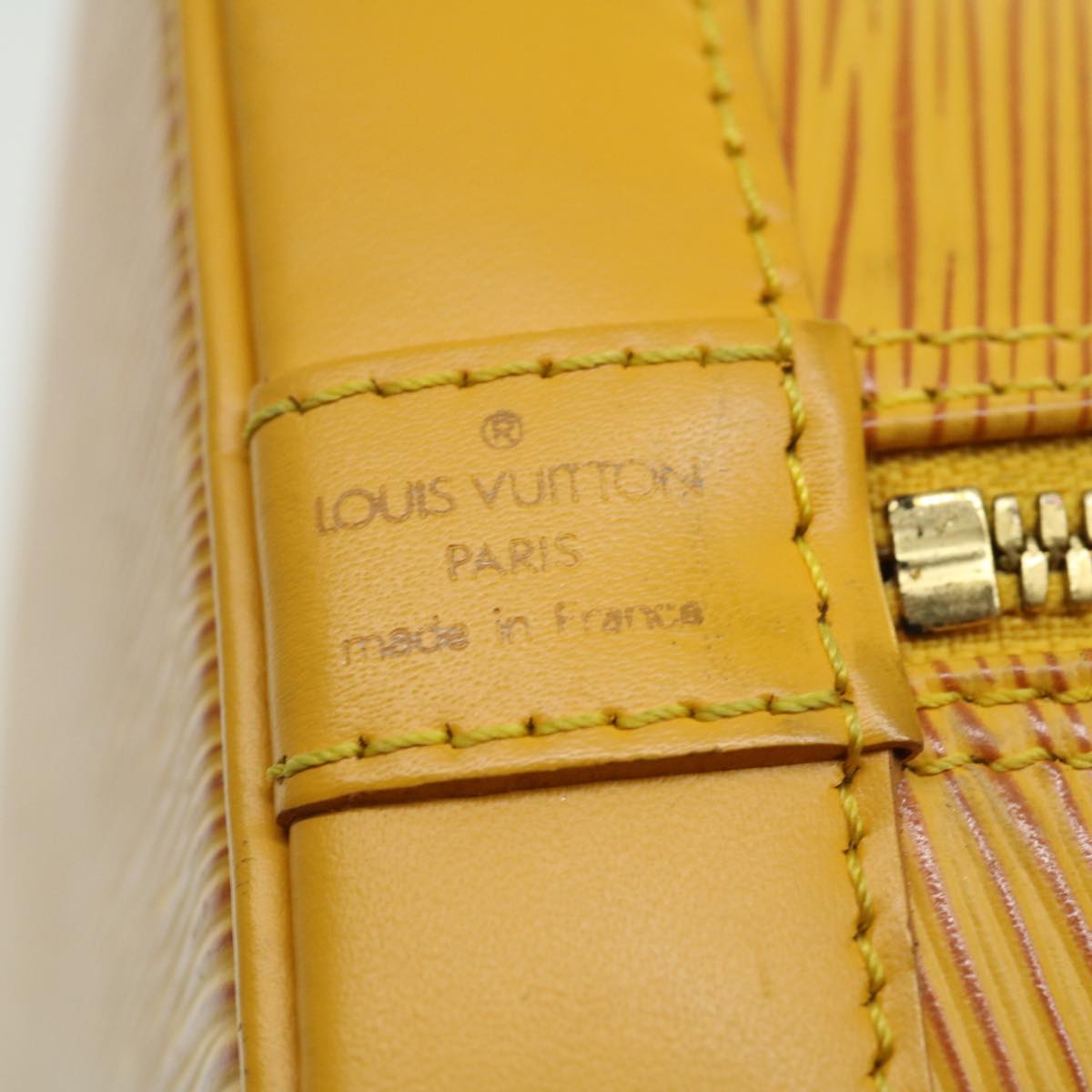 Louis Vuitton Alma Handbag