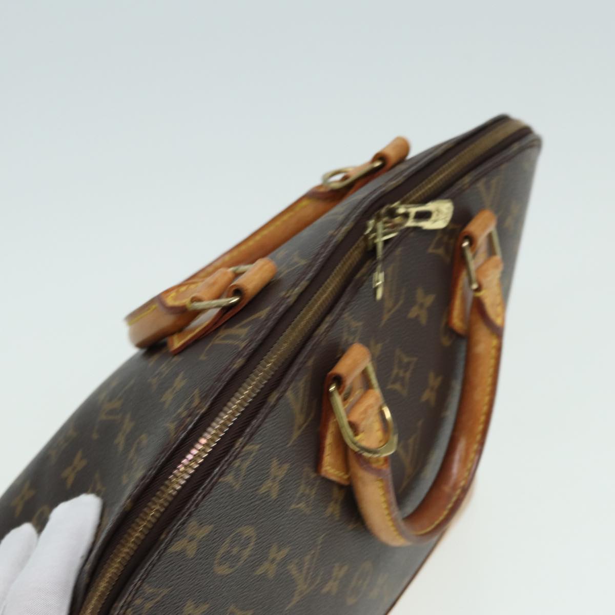 LOUIS VUITTON Alma Handbag