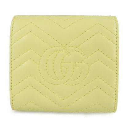 Gucci GG Marmont bi-fold wallet 598629 leather pastel yellow logo quilting L-shaped zipper compact