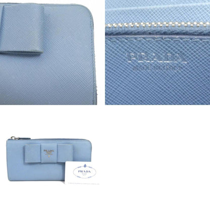 Prada L-shaped zipper long wallet logo ribbon leather light blue silver ladies