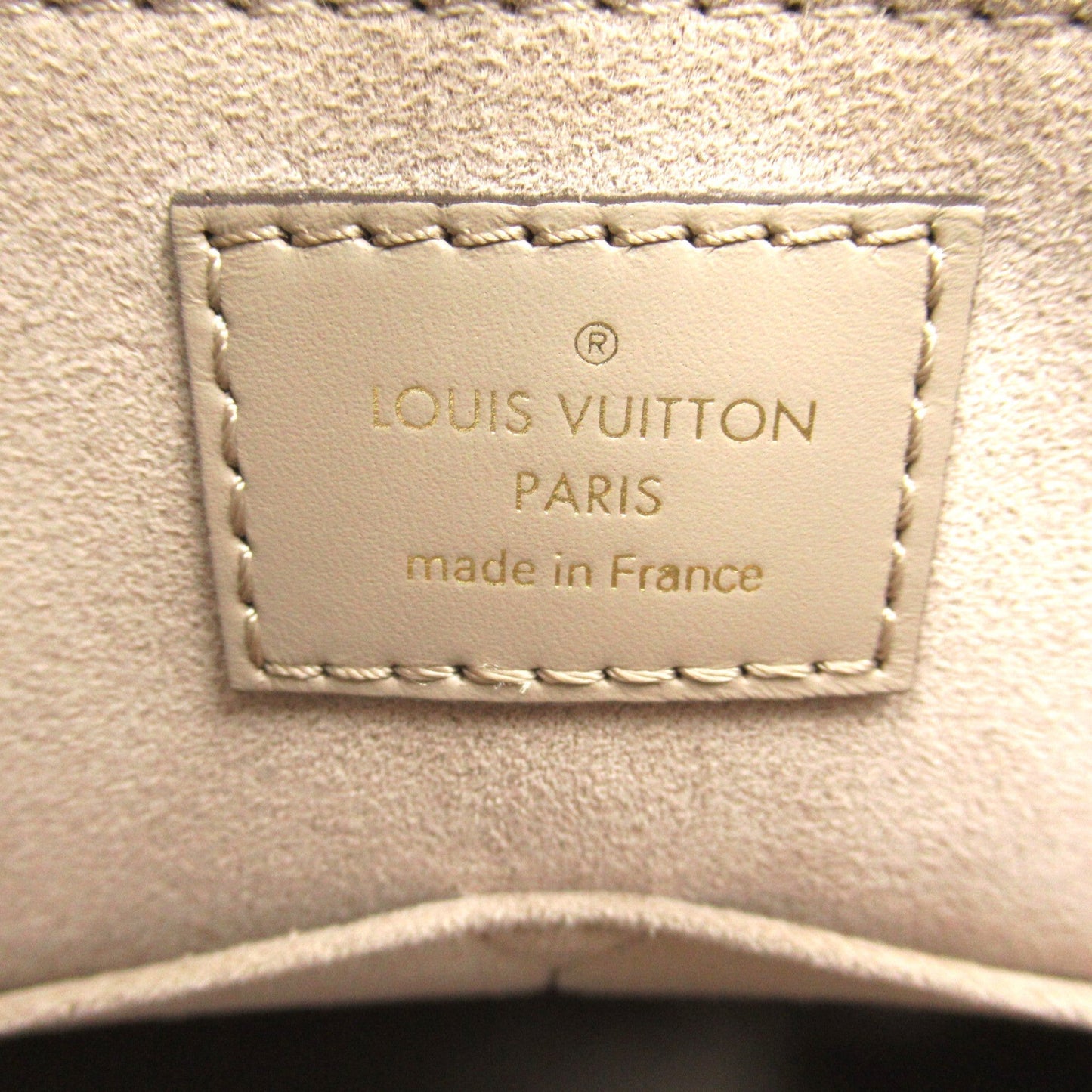 LOUIS VUITTON On the Go MM Beige Tour rail Monogram empreinte leather M45607