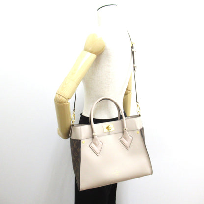 LOUIS VUITTON On My Side MM Brown Beige PVC coated canvas leather M58485