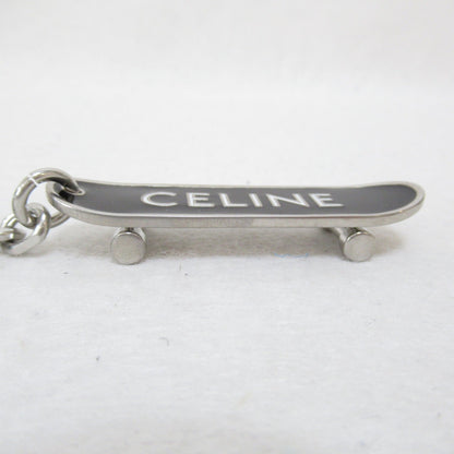 Celine skateboard charm Black White Plastic enamel 49I986BRE 38AW