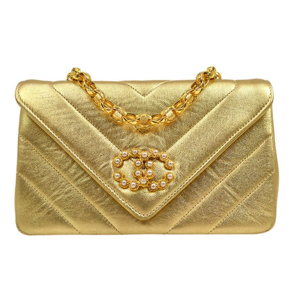 CHANEL 1991-1994 Gold Lambskin Chevron Faux Pearl CC Flap Bag