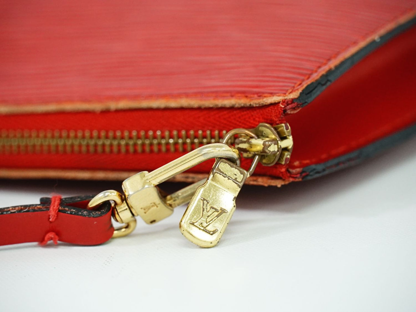 Louis Vuitton Pochette Epi Castilian Red M52947