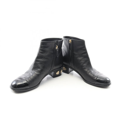 Chanel Coco Mark Camellia Leather Boots