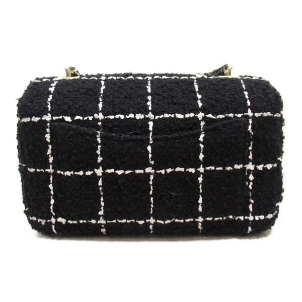Chanel Tweed Camellia Flap Bag Canvas Crossbody Bag in Excellent condition