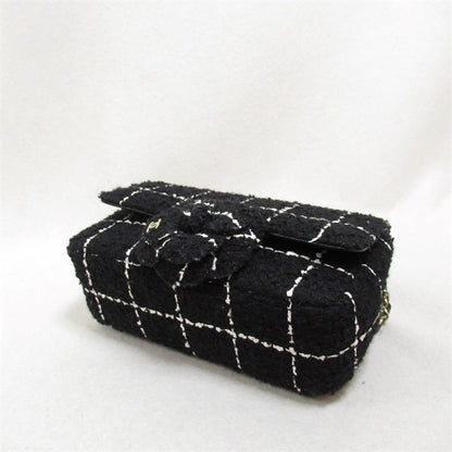 Chanel Tweed Camellia Flap Bag Canvas Crossbody Bag in Excellent condition