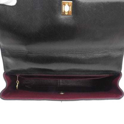 CHANEL Around 1995 Made Mademoiselle Stitch Turn-Lock Top Handle Bag Black