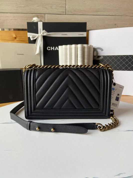 Chanel Boy V Caviar Handbags