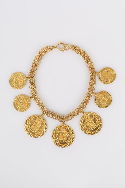 Collier doré Chanel