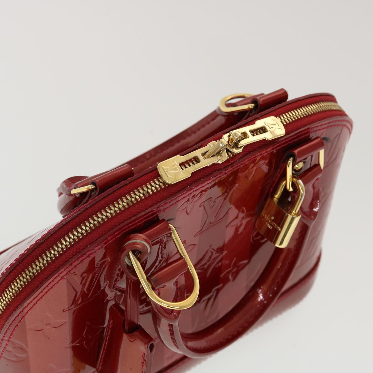 LOUIS VUITTON Vernis Rayure Alma BB Hand Bag Red M915593 LV Auth 44749