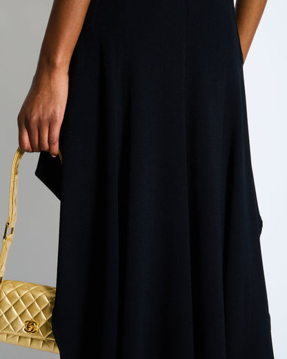 *RUNWAY* Chanel Métiers d'Art 2023 Black Front-Cropped Midi Skirt with Back Gold CC Logo Button Detail Size FR 34 (UK 6)