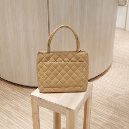 Chanel vintage medallion beige tote bag