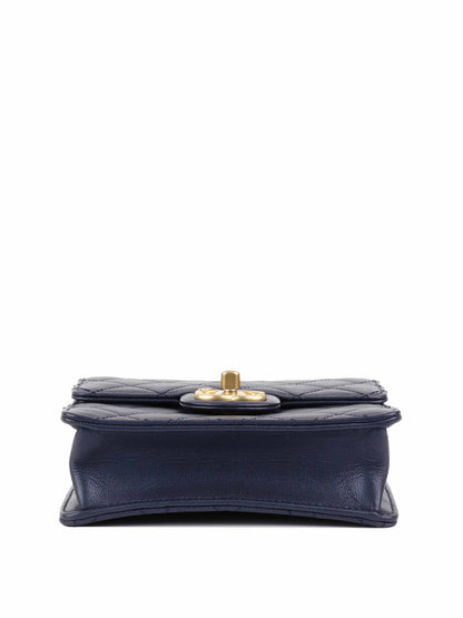 Chanel Navy Iridescent Flap Bag with Pearls.