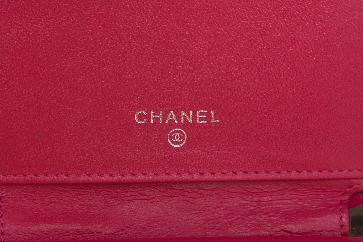 Chanel Pink Camellia Embossed Patent Leather Wallet