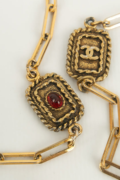 Collier doré Chanel 1984