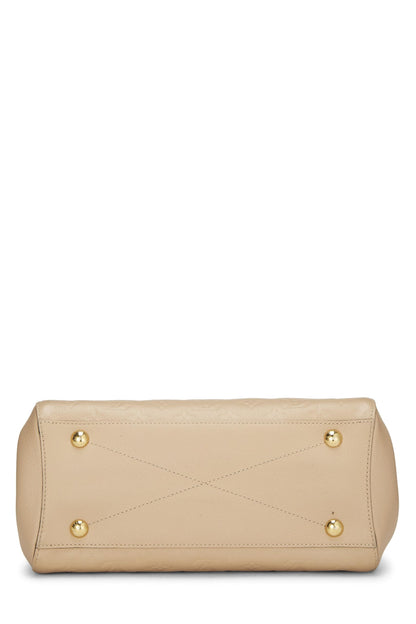 Louis Vuitton,  Dune Monogram Empreinte Montaigne MM, Beige