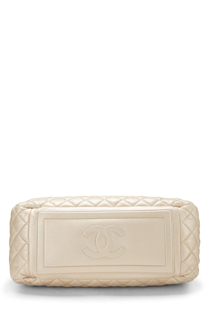 Chanel,  Gold Leather Coco Cocoon Bowling Bag, Gold