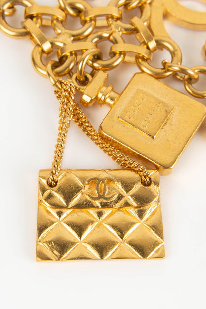 Broche charms Chanel 1995