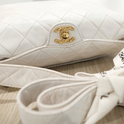 Chanel vintage diamond logo post bag