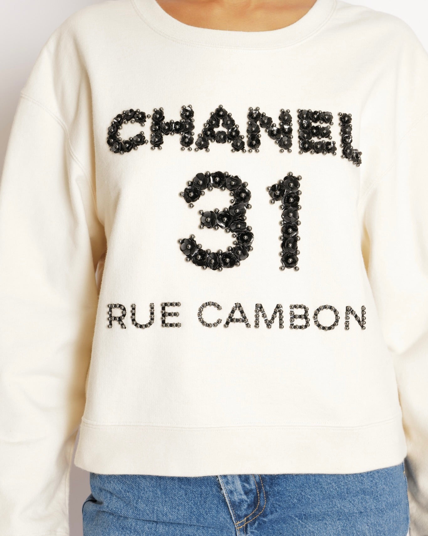 Chanel 20/A Beige 31 Rue Cambon Sweater with Black Floral Appliqué Logo Size L (UK 12)