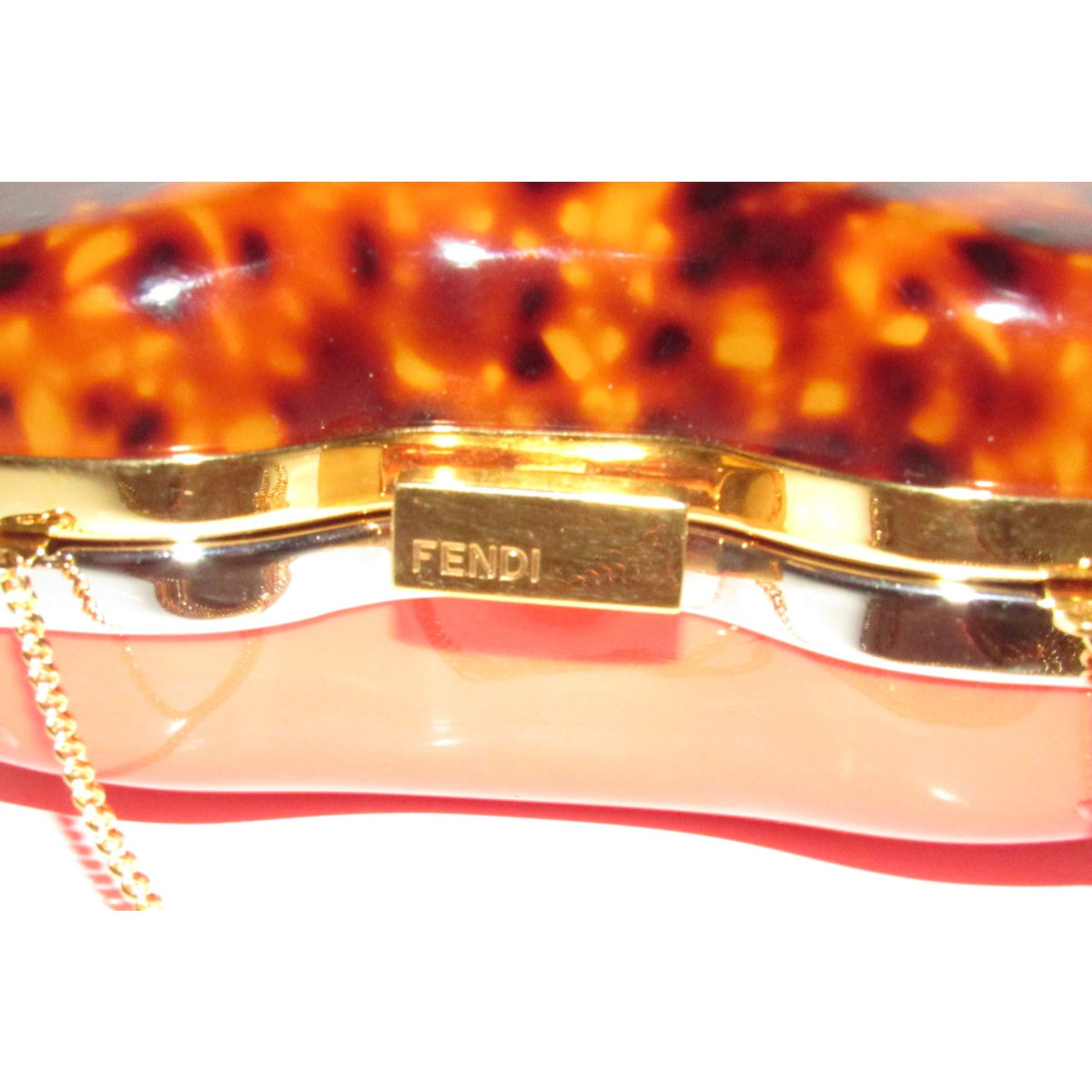 Retro, Fendi two way- clutch or cross body/shoulder clam shell style purse made of red & tortoise shell Lucite with a gold chain strap