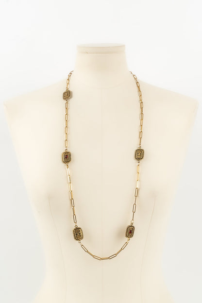 Collier doré Chanel 1984