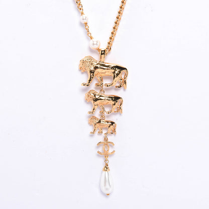 Chanel Gold Pearl 3 Lions CC Necklace
