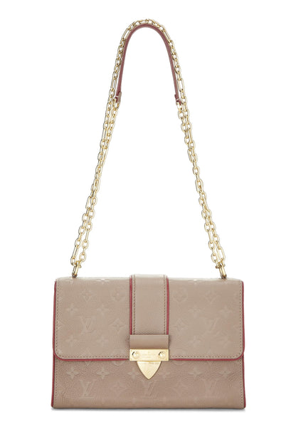 Louis Vuitton,  Bronze Monogram Empreinte Saint Sulpice PM, Beige