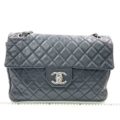 Chanel Classic Flap Maxi Black Soft Caviar Leather Silver-tone Hardware Giant CC Logo