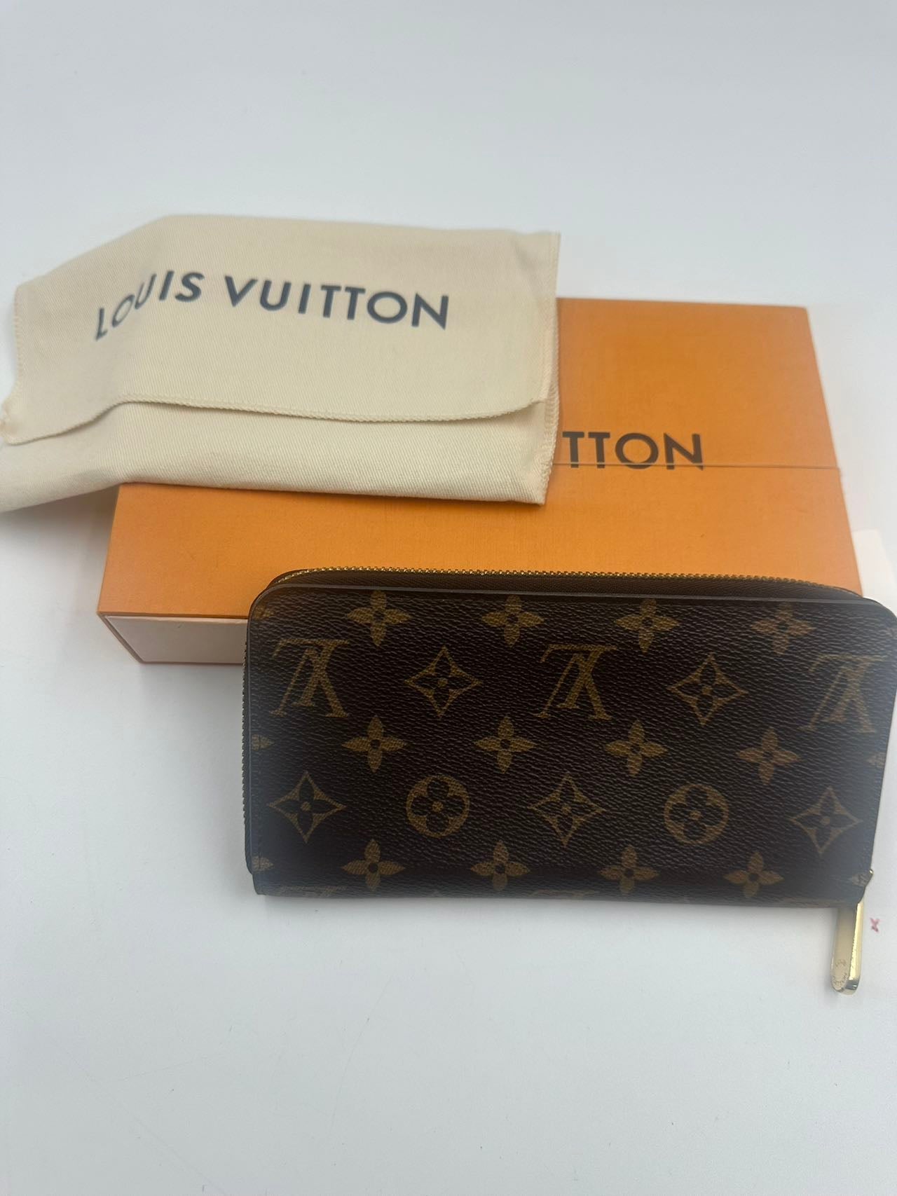 LOUIS VUITTON<br>Monogram Zip Wallet
