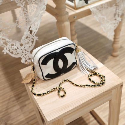 Chanel vintage CC camera crossbody bag with tassel