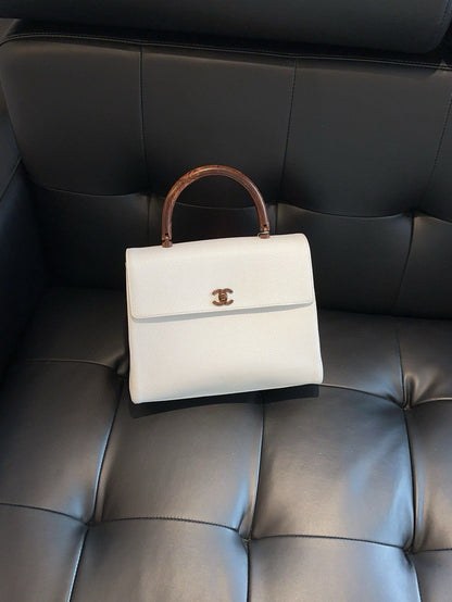 Vintage Chanel Kelly bag Caviar leather *.cm white